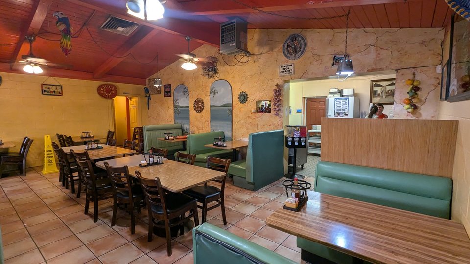 A cozy restaurant interior with seating